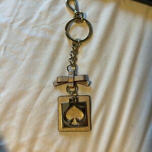 Kate Spade keychain in rose gold